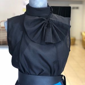 Sheer sleeveless top with bow